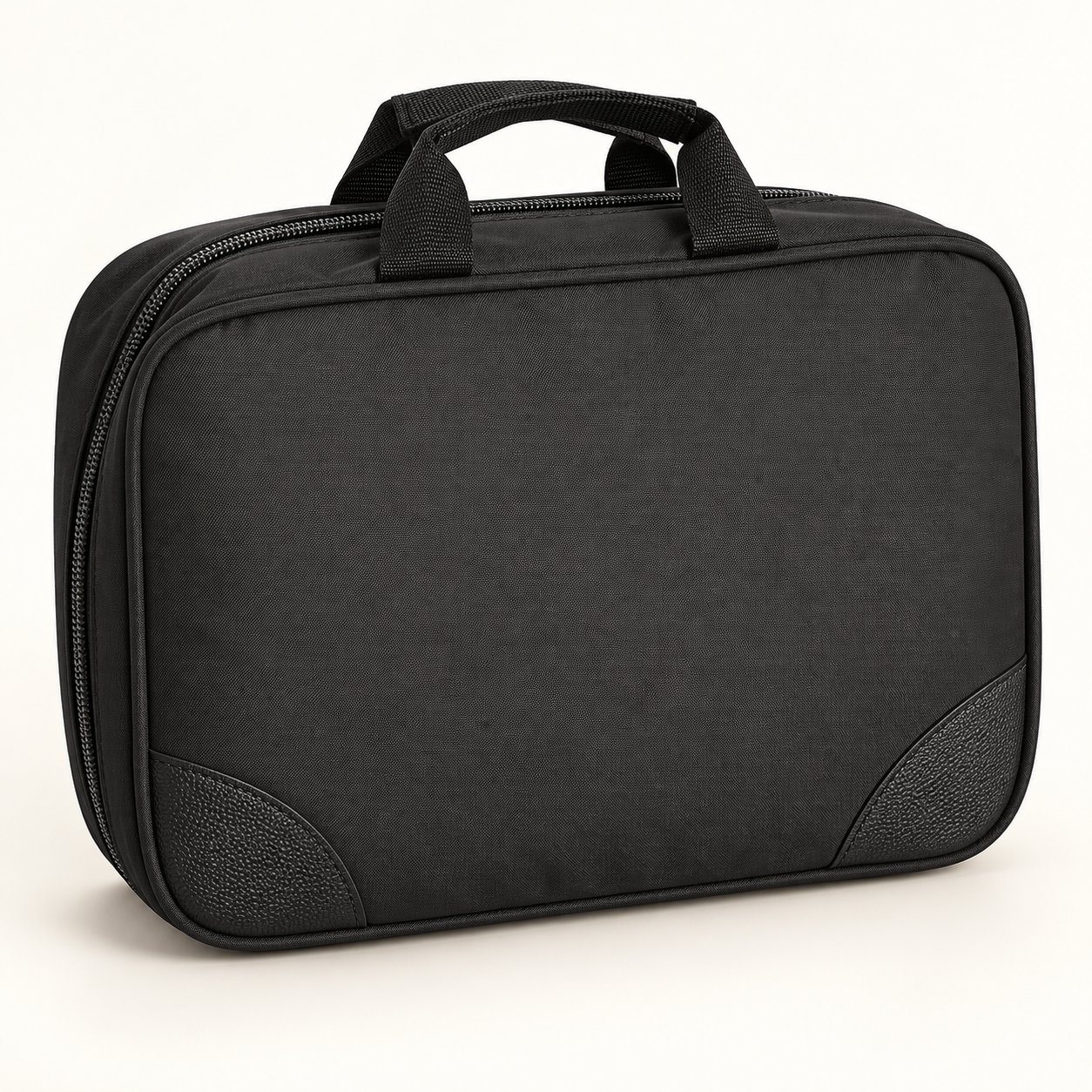 Black folded toiletry kit with carry handle
