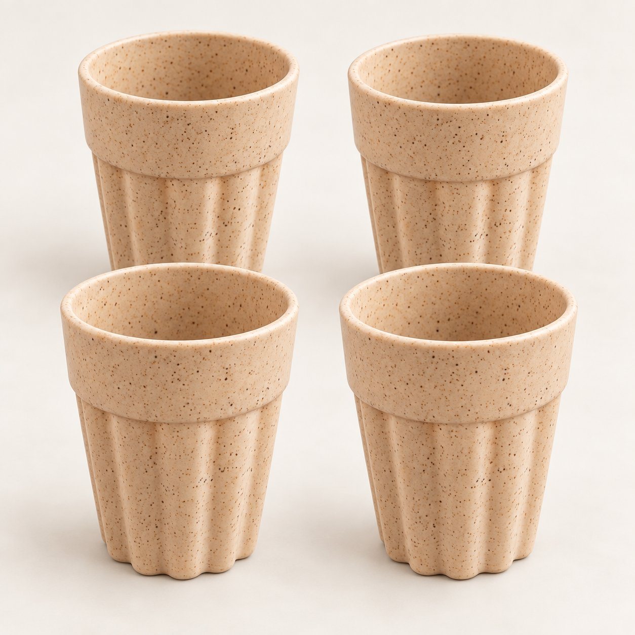 Four natural beige wheat-straw cutting chai cups