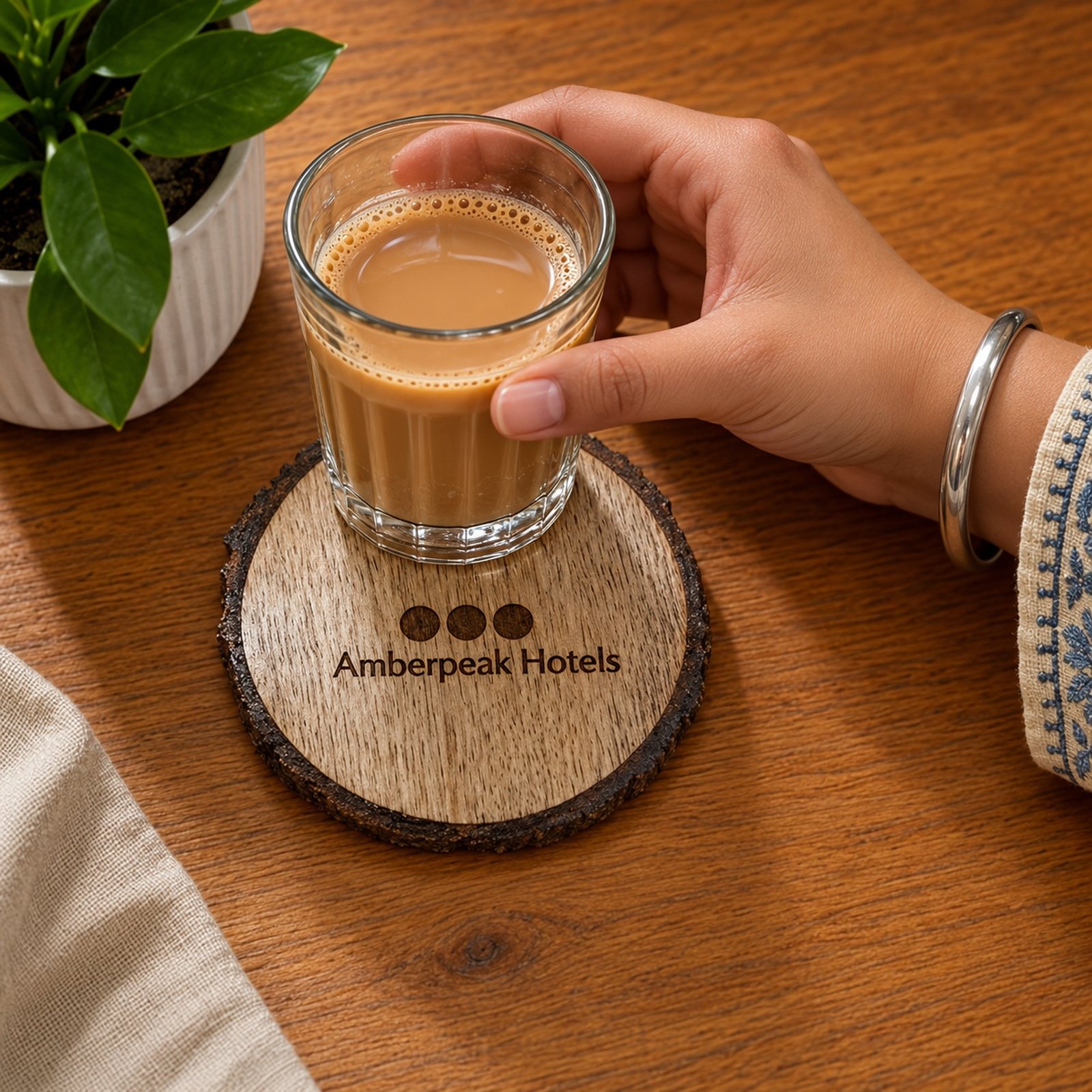 Click to zoom Mango Wood Coaster Bark & Branding, shown in use