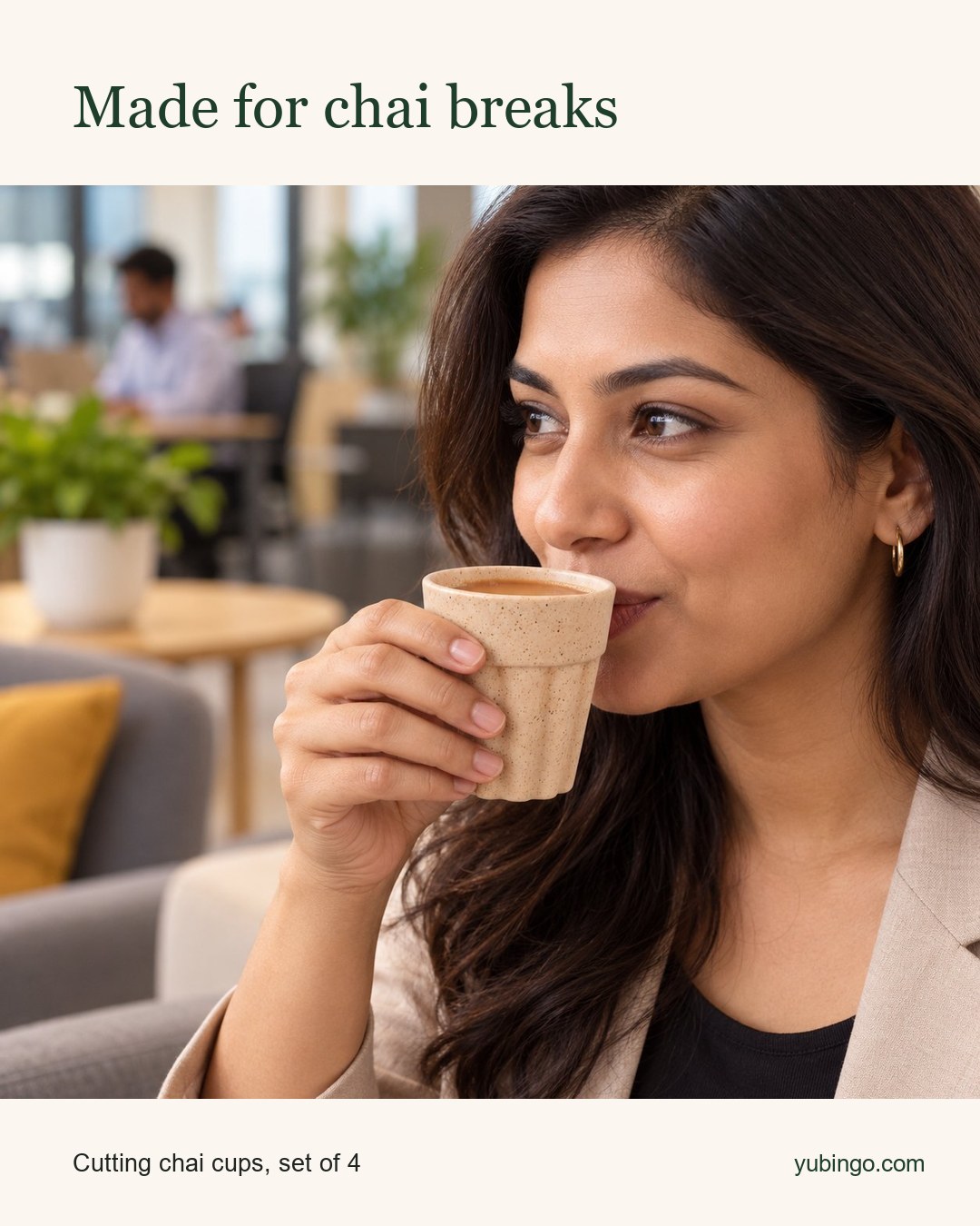 A woman sipping chai from a small beige cutting chai cup in a bright office lounge. Text: Made for chai breaks. Cutting chai cups, set of 4.